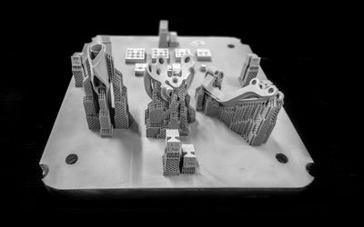 Re-Architecting Additive Manufacturing for Scale