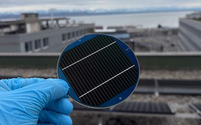 Record efficiency for perovskite-silicon triple-junction solar cells