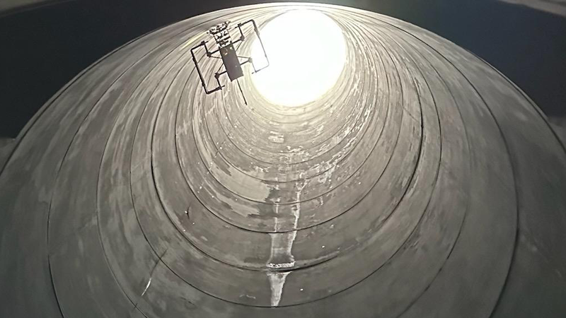 First non-entry ultrasonic testing (UT) inspection in a confined space using an aerial robot