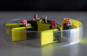 Shape-Shifting Robot Built from Smarticles Shows New Locomotion Strategy