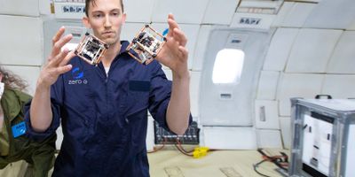 MIT PhD student Martin Nisser tests self-reconfiguring robot blocks, or ElectroVoxels, in microgravity. Photo: Steve Boxall/ZeroG