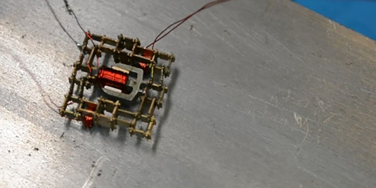 This walking microrobot was built by the MIT team from a set of just five basic parts, including a coil, a magnet, and stiff and flexible structural pieces.  This walking microrobot was built by the MIT team from a set of just five basic parts, including a coil, a magnet, and stiff and flexible structural pieces.  Photo by Will Langford