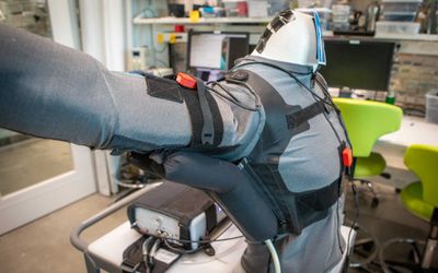 A Wearable Robot That Learns