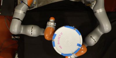 MIT researchers developed an AI technique that enables a robot to develop complex plans for manipulating an object using its entire hand, not just the fingertips. This model can generate effective plans in about a minute using a standard laptop. Here, a robot attempts to rotate a bucket 180 degrees. Image: Courtesy of the researchers