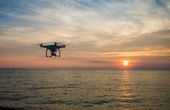 Monitoring maritime emissions at land and sea using drones and handheld particle sensors