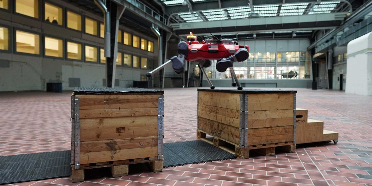 The quadrupedal robot ANYmal practises parkour in a hall at ETH Zurich. (Photograph: ETH Zurich / Nikita Rudin)