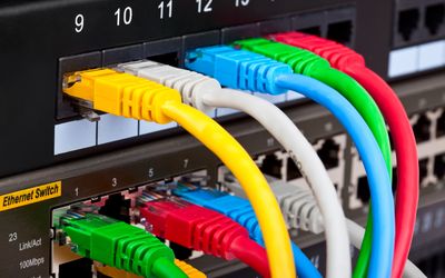 Navigating Network Infrastructure: Patch Panel vs Switch