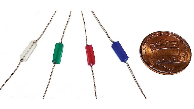 This image shows examples of MAGENTA prototypes fabricated with a “shape memory alloy” spring and an elastomer, and how their sizes compare to that of a one cent coin. Credit: Wyss Institute at Harvard University