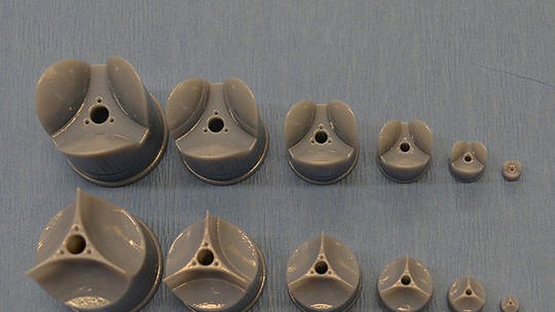 In rotary jet spinning technology, a rotating nozzle extrudes a solution of extracellular matrix (ECM) into nanofibers that wrap themselves around heart valve-shaped mandrels. By using a series of mandrels with different sizes, the manufacturing process becomes fully scalable and is able to provide JetValves for all age groups and heart sizes. (Photo courtesy of Wyss Institute at Harvard University)