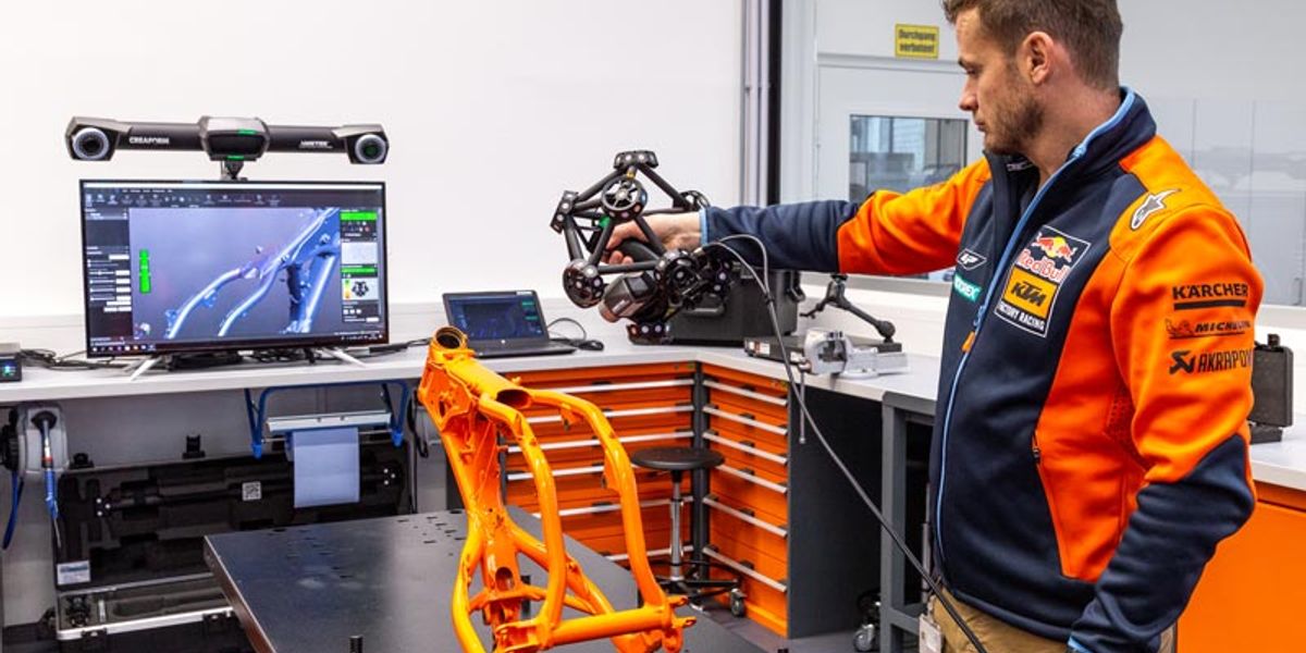 Quality Controller Motorsport Christian Schwarz performs 3D scanning of the motorcycle frame