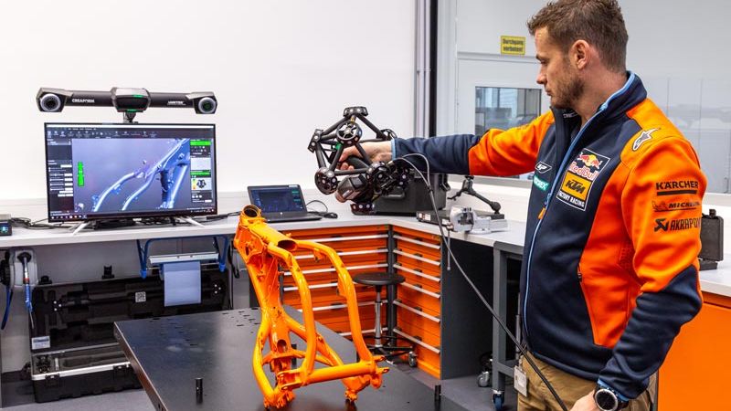 Quality Controller Motorsport Christian Schwarz performs 3D scanning of the motorcycle frame