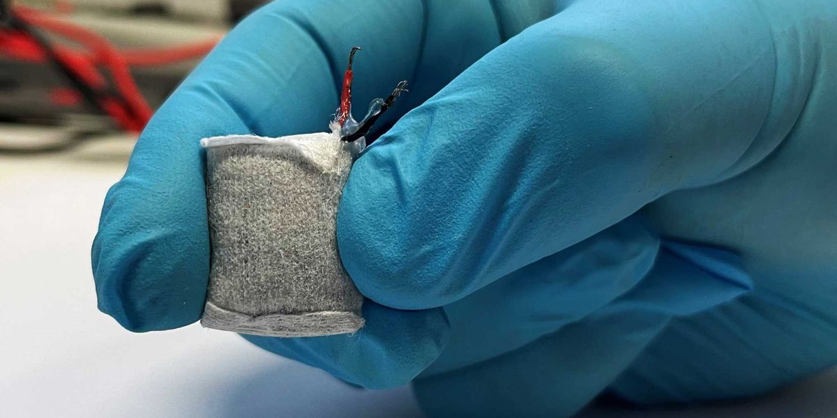 The prototype fuel cell is wrapped in a fleece and is slightly larger than a thumbnail. (Photograph: Fussenegger Lab / ETH Zurich)