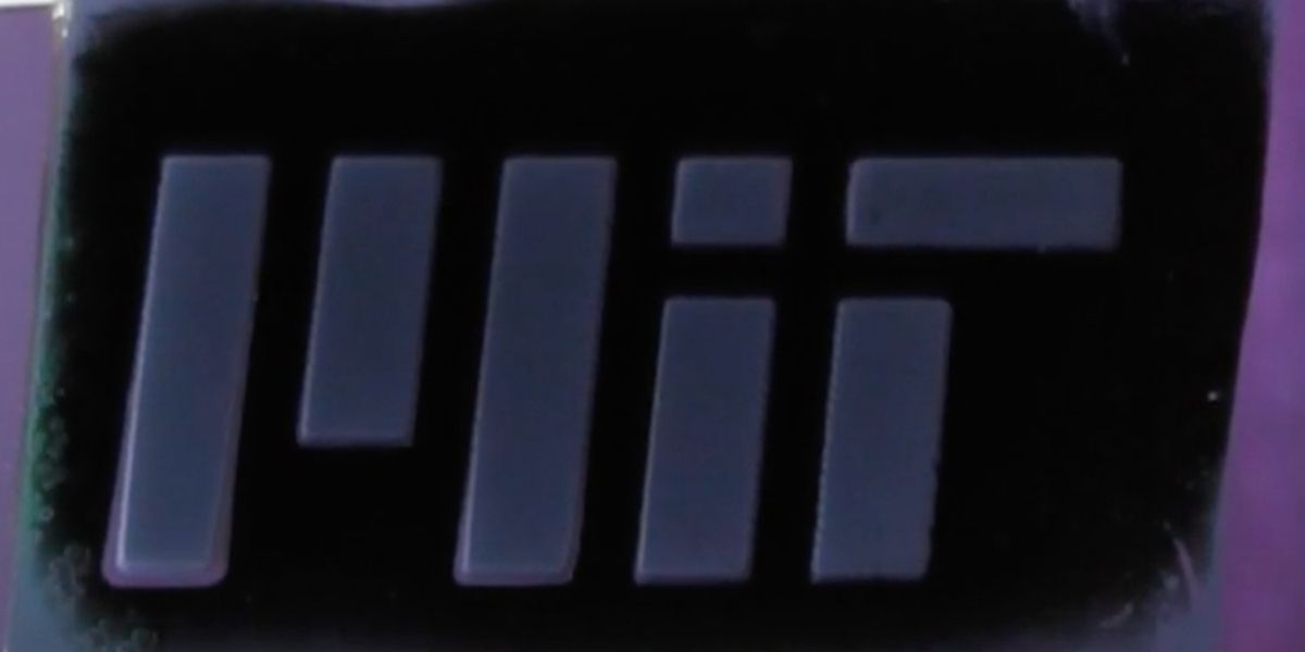 MIT engineers fabricate a forest of “white graphene” nanotubes (shown here patterned as MIT) by burning away a scaffold of black carbon. Image: Courtesy of the researchers