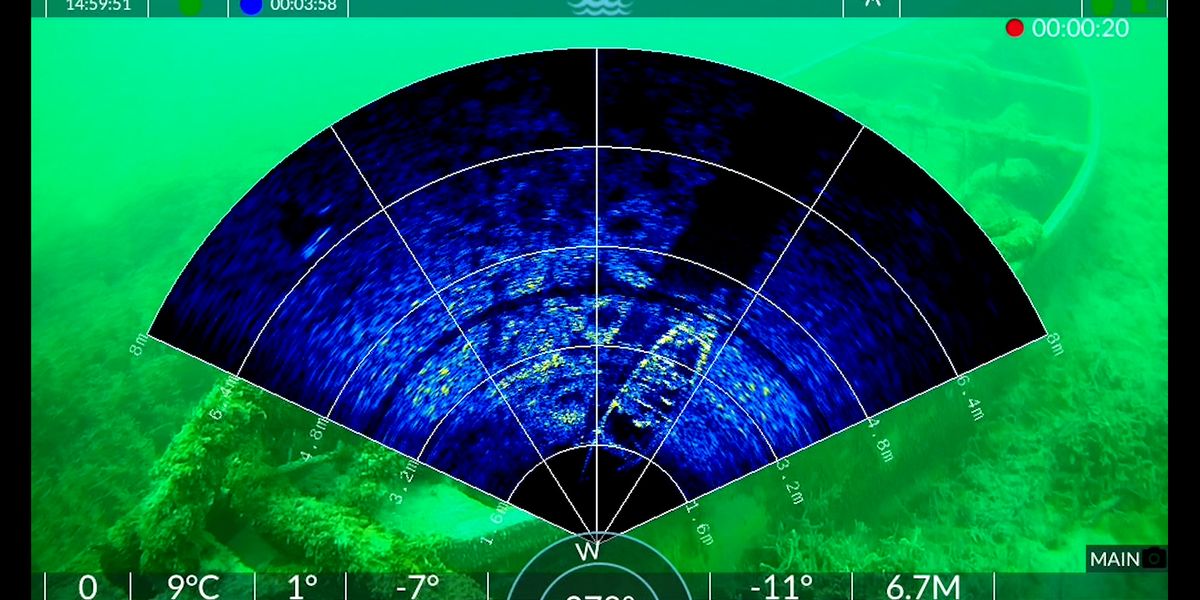 Sonar scan overlay with camera image in background.