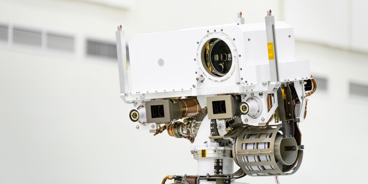A close-up of the head of Perseverance Rover's remote sensing mast. The mast head contains the SuperCam instrument (its lens is in the large circular opening). In the gray boxes beneath mast head are the two Mastcam-Z imagers. On the exterior sides of those imagers are the rover's two navigation cameras. Image Credit: NASA/JPL-Caltech