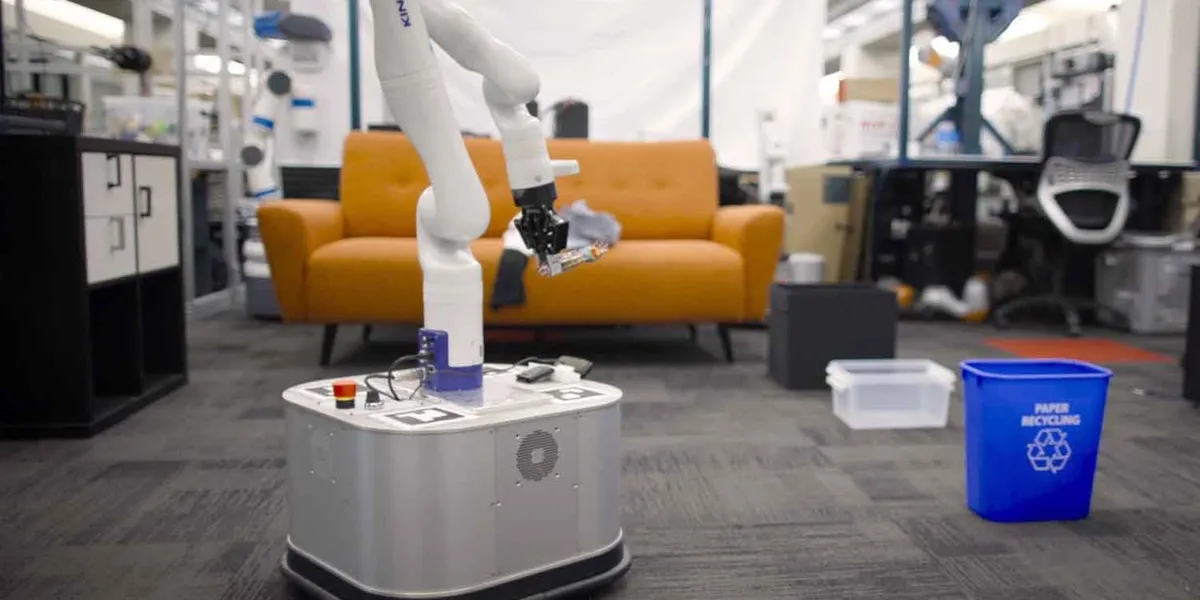 TidyBot is trained within a specific space so it can learn how different types of objects are put away in that area. For example, the researchers were able to make it put clothes on the couch. (Image credit: Kurt Hickman)