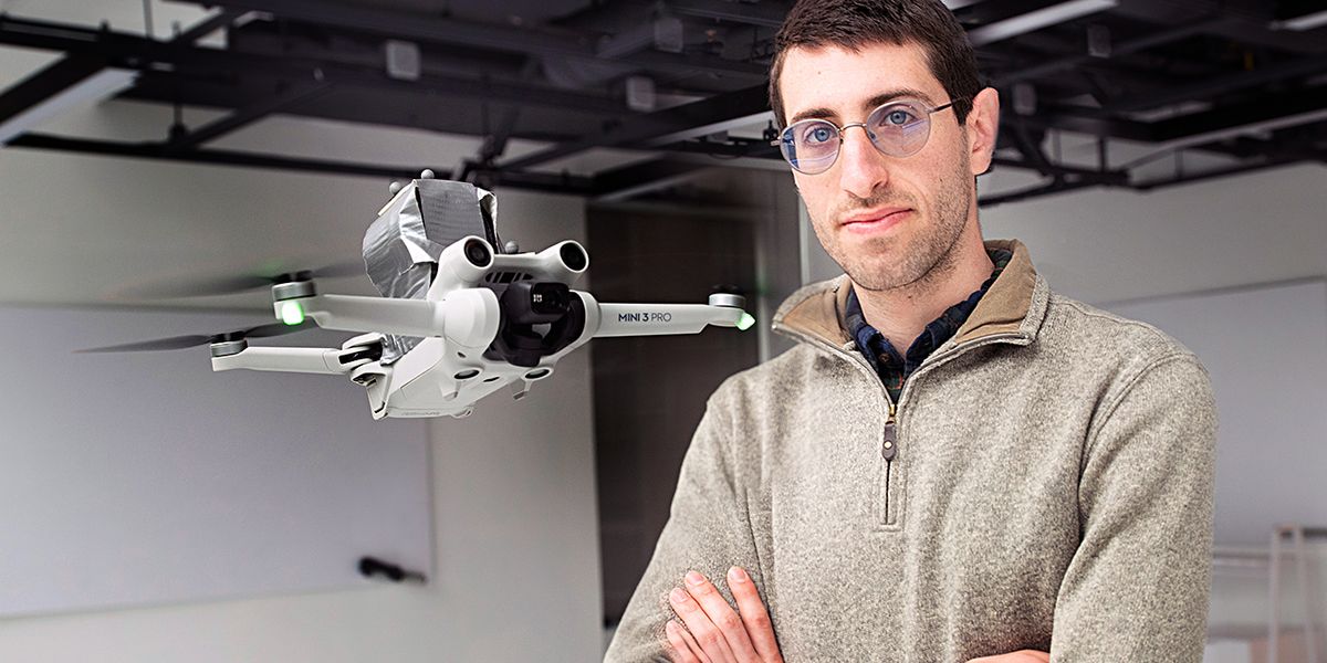 Michael Soskind, first author and graduate student in electrical and computer engineering, stands with the drone. Photo by Bumper DeJesus