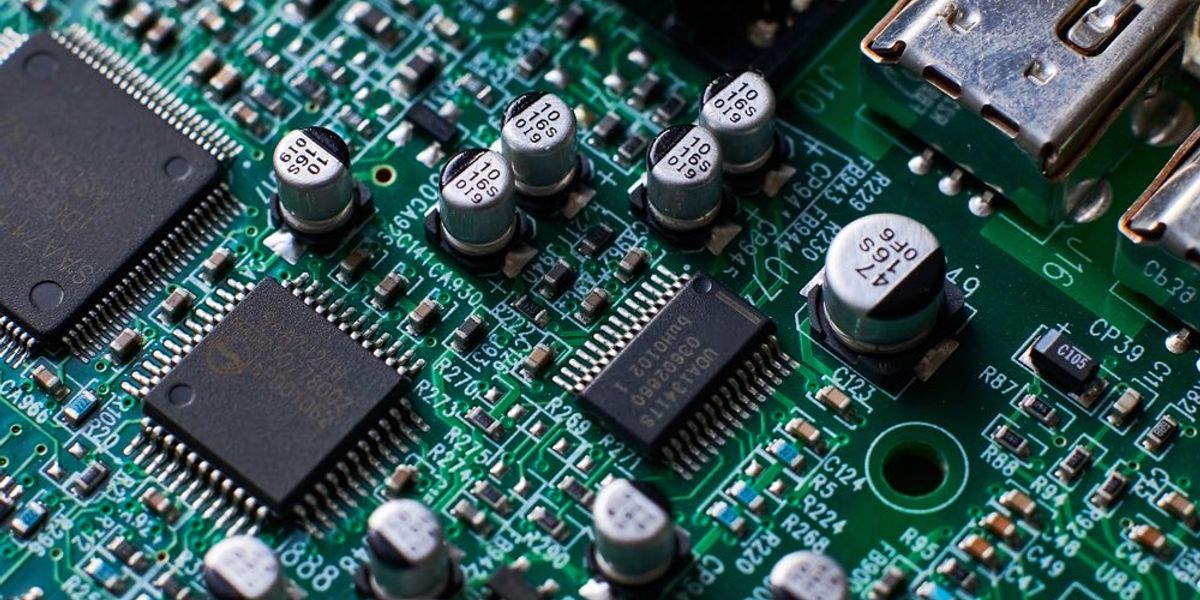 Fig 1 - Printed Circuit Board Chips and Radio Components