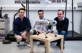 Trotting robots reveal emergence of animal gait transitions