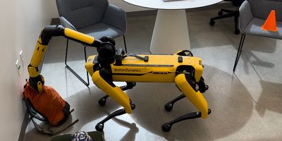 MIT’s Clio runs in real-time to map task-relevant objects in a robot’s surroundings, allowing the bot (Boston Dynamic’s quadruped robot Spot, pictured) carry out a natural language task (“pick up orange backpack”). Credit: Courtesy of the researchers