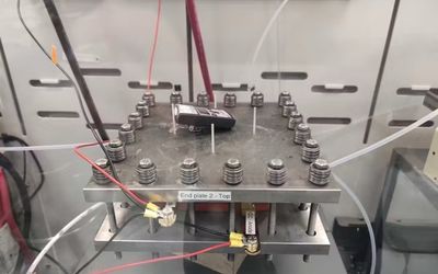 Inexpensive materials transform waste carbon into energy-rich compounds