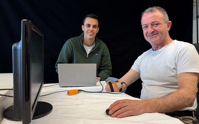 Amputee and researcher go prosthetic hand in hand towards progress