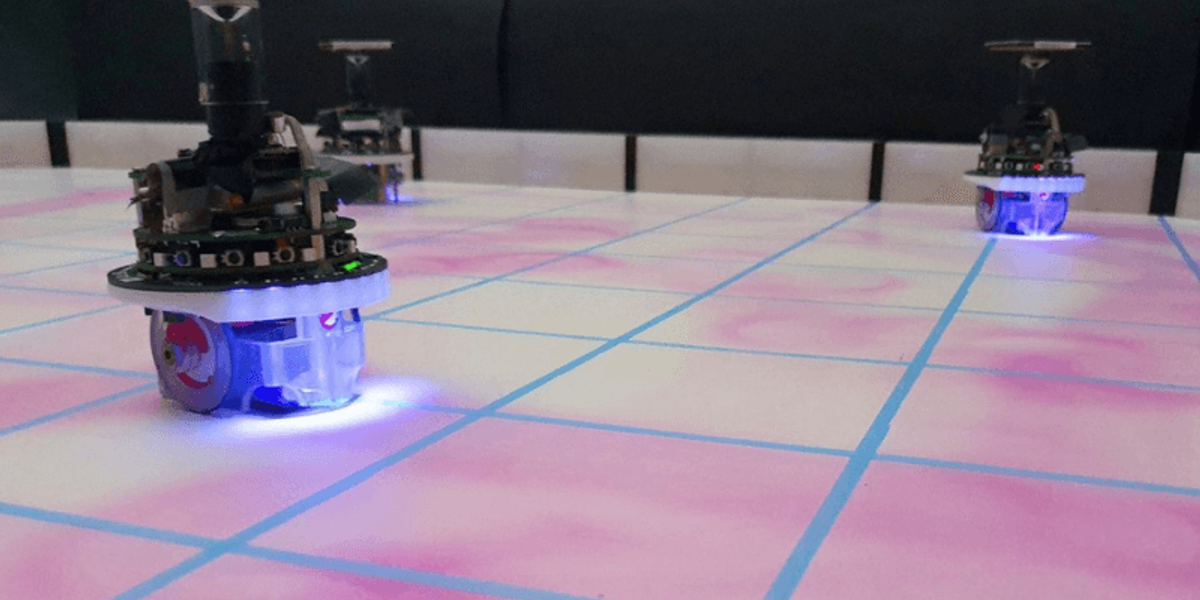 A swarm of e-puck robots equipped with UV-pheromone-module and omni-directional camera to release artificial es pheromone [Image Credit: Research Paper]