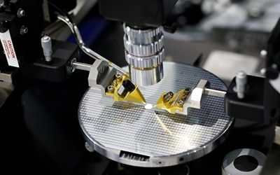 Programmable optical chip merges photons to change color