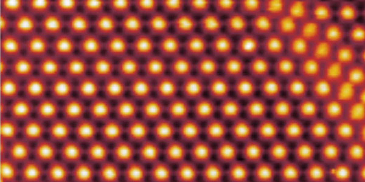 Image: The surface of a trilayer of graphene, as imaged by a scanning tunneling microscope. Due to the twist of a second layer, trilayer height is modulated with a period of about 9 nanometers.
