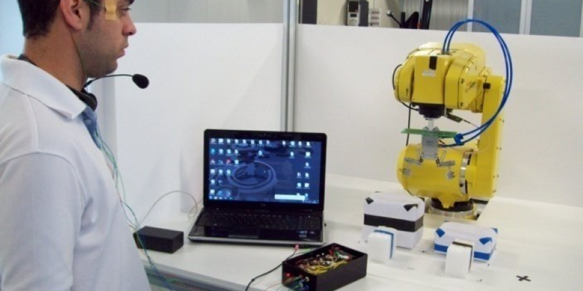 Researchers experimenting with VUI for robotic control. Image credit: Azorin, 2013 et al. 