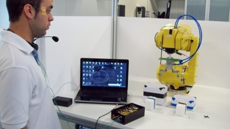 Researchers experimenting with VUI for robotic control. Image credit: Azorin, 2013 et al. 