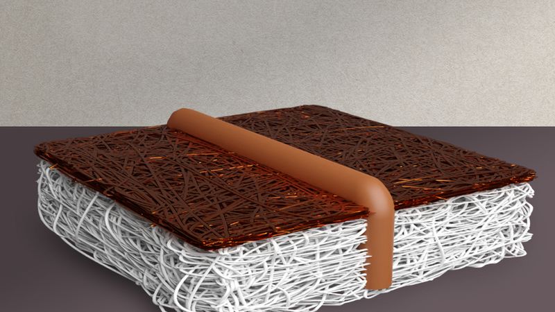 A conceptual schematic of the new woven electrode design. Researchers wove a series of conductive copper wires (the brown-orange pipe) through a very thin membrane to reach the catalyst. Image: Courtesy of the researchers, edited by MIT News