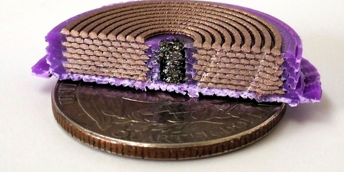 MIT researchers modified a multi-material 3D printer so it could produce three-dimensional solenoids in one step by layering ultrathin coils of three different materials. It prints a U.S. quarter-sized solenoid as a spiral by layering material around the soft magnetic core, with thicker conductive layers separated by thin insulating layers. Image: Courtesy of the researchers