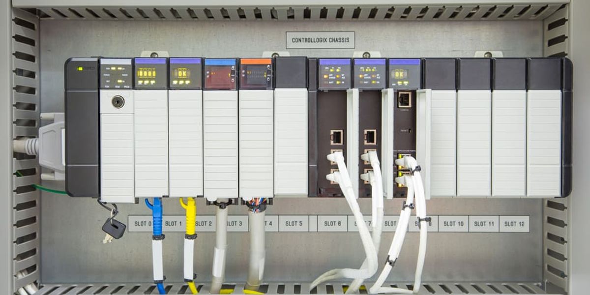 A Programmable Logic Circuit (PLC) with analog digital input and output card, with power supply and processor module