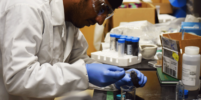 Graduate student Kailash Arole uses electrochemical exfoliation to separate graphene from petroleum coke. | Image: Texas A&M Engineering