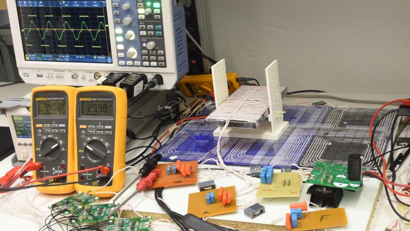 Seen here in prototype form, this wireless power system can track where a receiver to activate and deactivate particular coils.