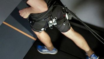 Tethered soft exosuit reduces the metabolic cost of running