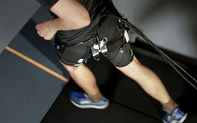 Tethered soft exosuit reduces the metabolic cost of running