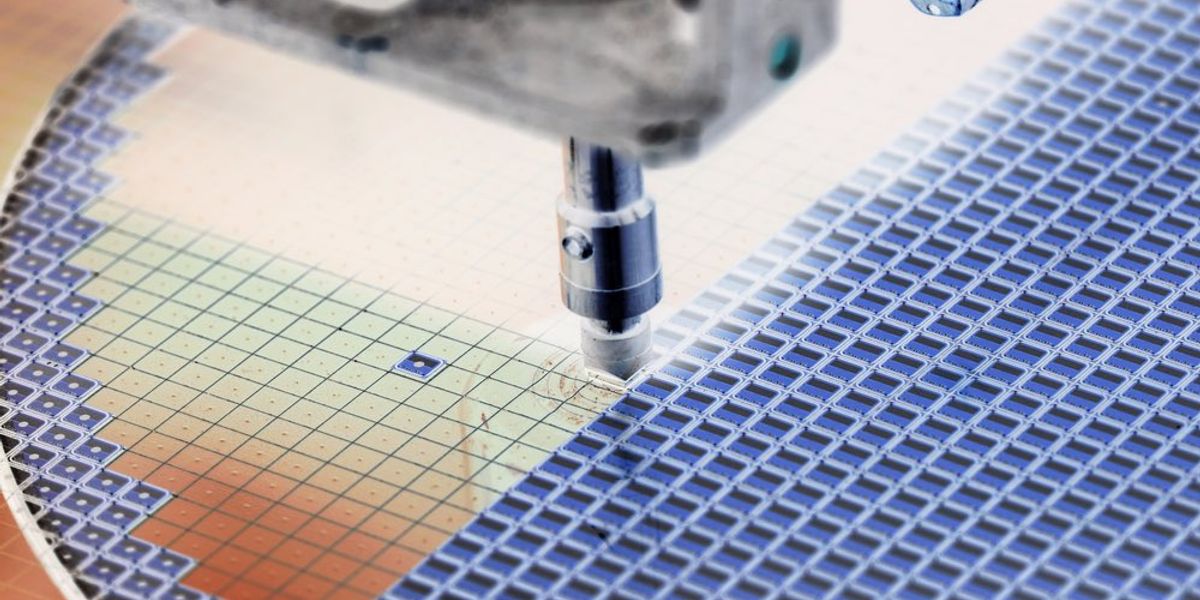 A close-up of a silicon wafer during semi-conductor manufacturing