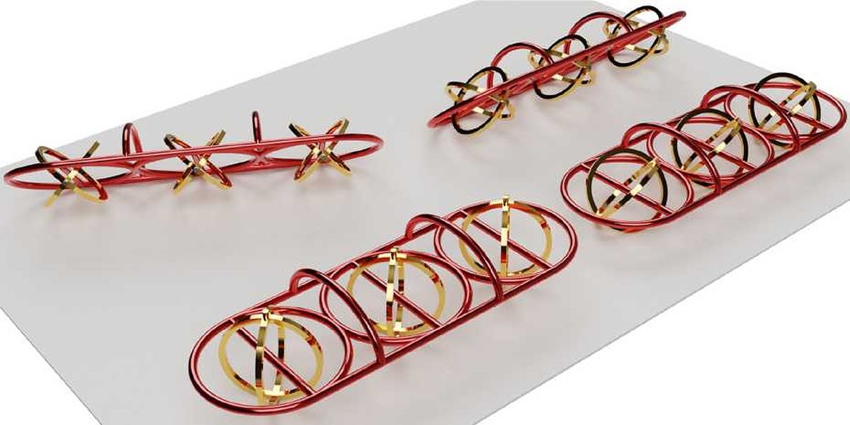 Computer graphic of a microvehicle with iron wheels (gold) and a polymer chassis (red). The vehicle measures just 0.25 millimetres long. (Visualisations: Alcântara et al. Nature Communications 2020)