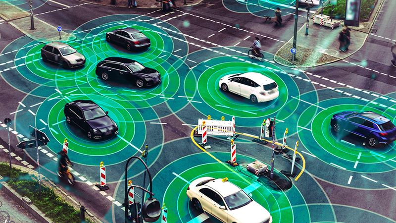 Implementing co-driving techniques can significantly reduce intersection carbon dioxide emissions without impacting traffic throughput or safety, according to new MIT research. Image: iStock; MIT News