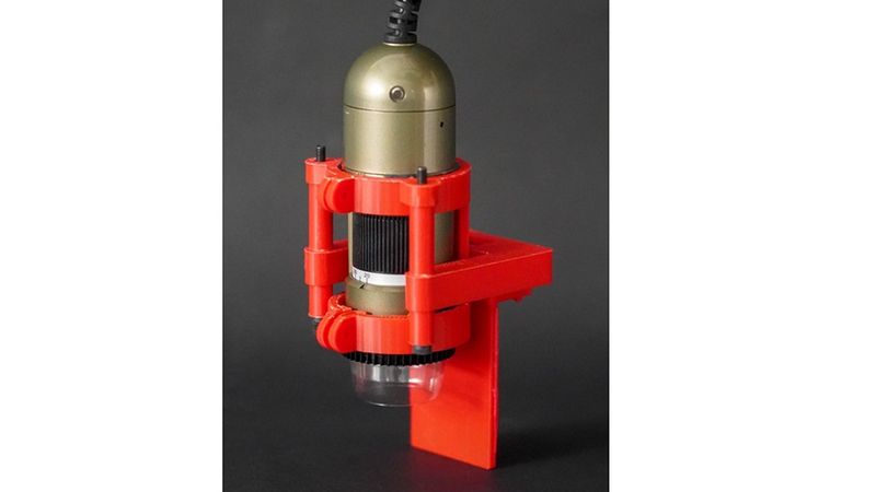 The monitoring platform is composed of a digital microscope housed within a custom 3D-printed support. Photo courtesy of the researchers.