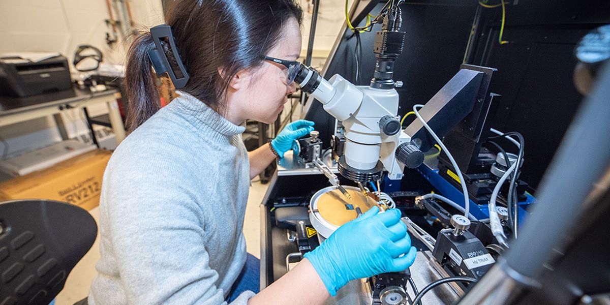 ECE PhD student Tonglin (Tanya) Newsom in the lab of Prof. Becky (R.L.) Peterson, measuring the electrical characteristics of thin film transistors. Photo by Silvia Cardarelli, Michigan ECE.