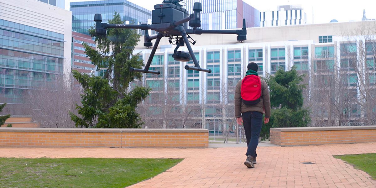 Makram Chahine, a PhD student in electrical engineering and computer science and an MIT CSAIL affiliate, leads a drone used to test liquid neural networks. Photo: Mike Grimmett/MIT CSAIL