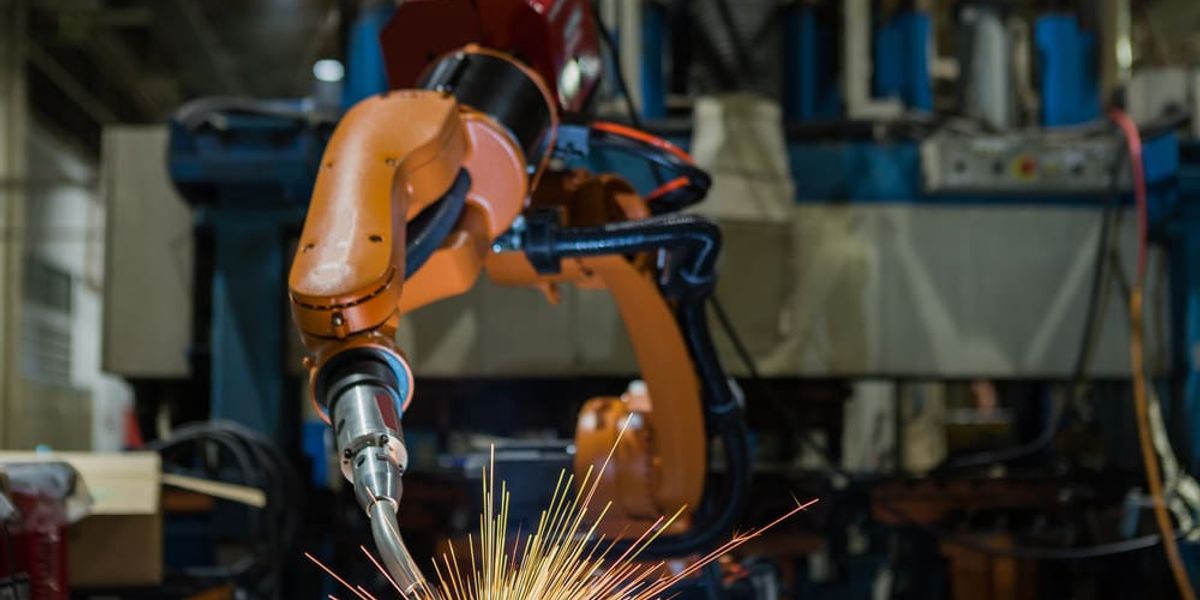 Robotic arm welding in factory