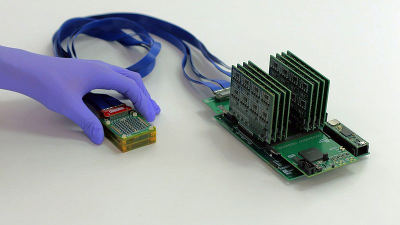 The new system consists of a small ultrasound probe, on left, attached to an acquisition and processing module that is a little larger than a smartphone. Credit: Conformable Decoders Lab at the MIT Media Lab