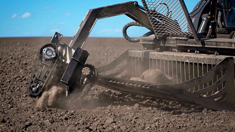 TerraClear's robotic arm attachment for rock picking (image credit: TerraClear)