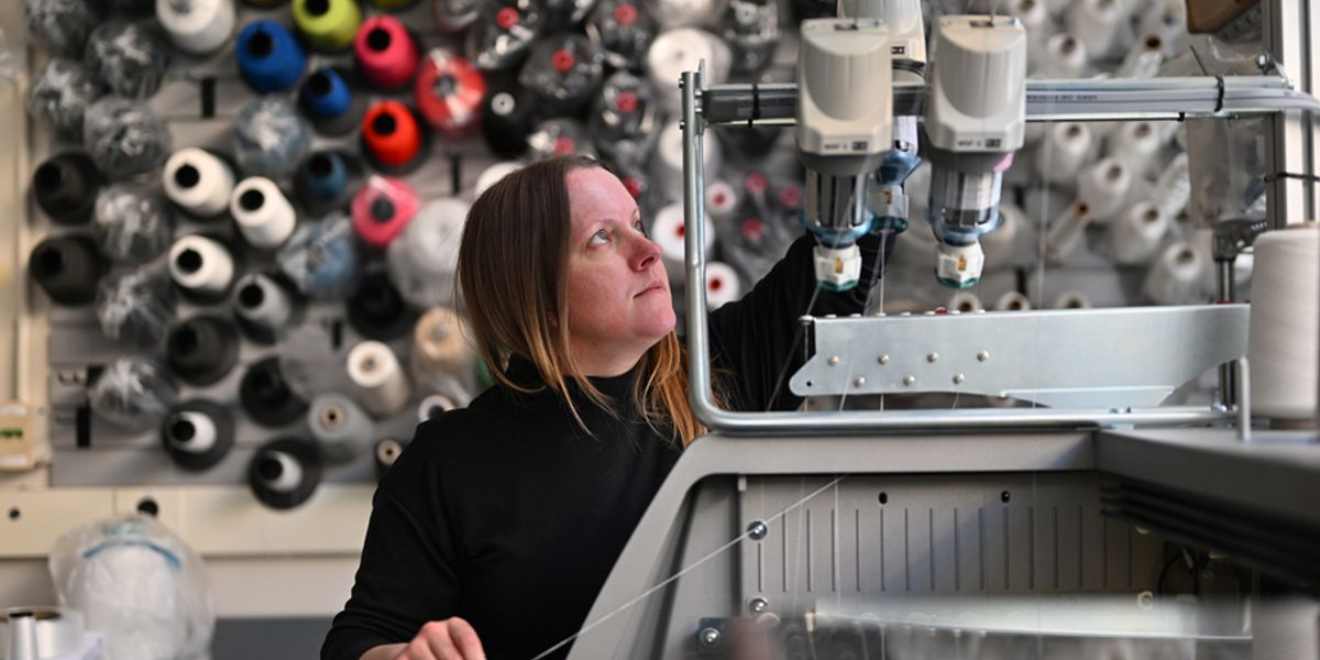PhD student Lavender Tessmer has devoted herself to several projects throughout grad school, but all share a common thread: an emphasis on fiber development and textile programming. “At MIT, my interest in textiles really exploded and became the center of everything,” she says. Photo: Gretchen Ertl