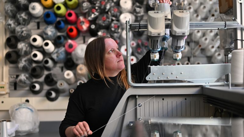 PhD student Lavender Tessmer has devoted herself to several projects throughout grad school, but all share a common thread: an emphasis on fiber development and textile programming. “At MIT, my interest in textiles really exploded and became the center of everything,” she says. Photo: Gretchen Ertl