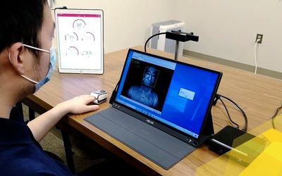Touchless respiratory and heart rate measurement for COVID-19 health screening